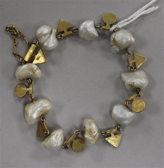 An 18ct gold and baroque pearl bracelet.